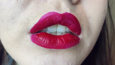 Rebecca Noir Put-On-Red-Lipstick-Close-Up-View