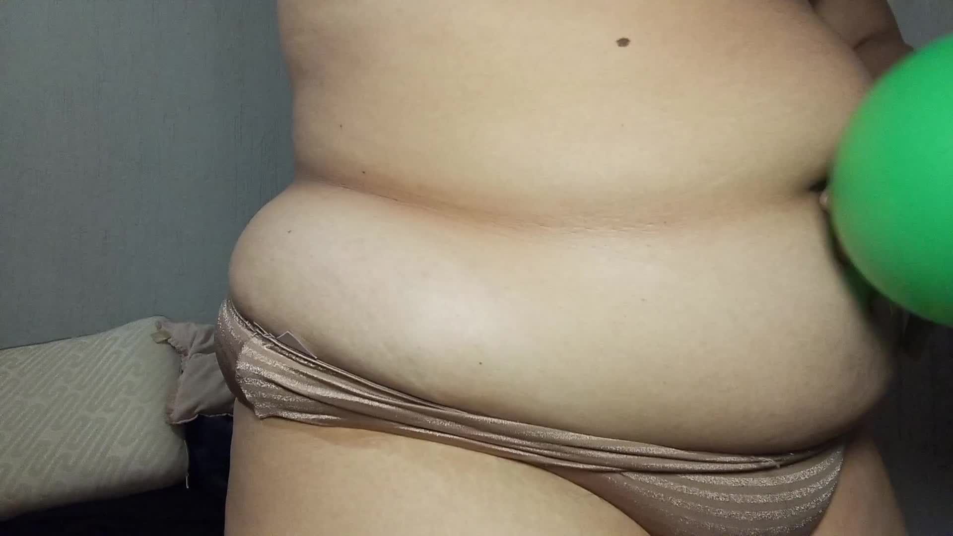 Belly Inflation Illusion With Balloon. Stomach Expanding And Deflating Play