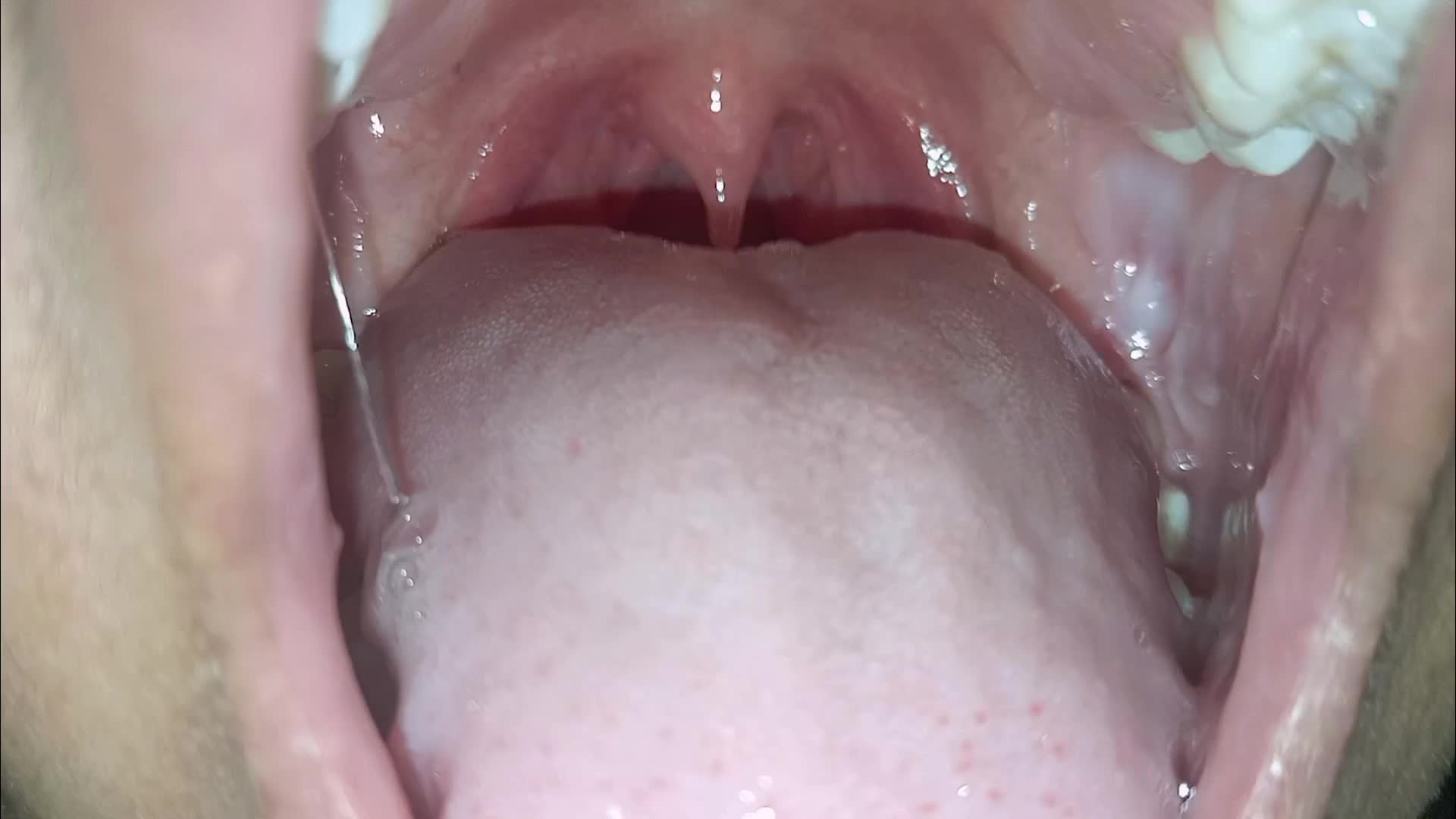 Open Wet Mouth Burping. Close-Up Uvula