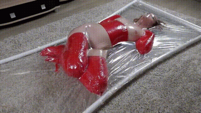 Red Stretch Film Bondage In A Vacuum Bed