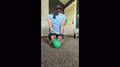 Balloon Sitting Blindfolded & Restrained Trying To Pop