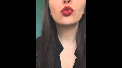 Application Of Matte Red Lipstick, Blowing Kisses Towards The Camera
