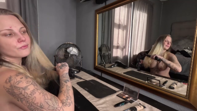 Sexy Tattooed Blonde Girl Doing Her Hair And Makeup Naked