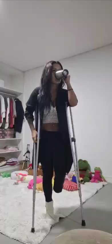 Amputee Bk Crutching With White Heel Boot