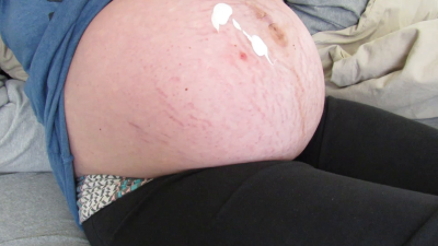 Heavy Pregnant Belly Lotioning