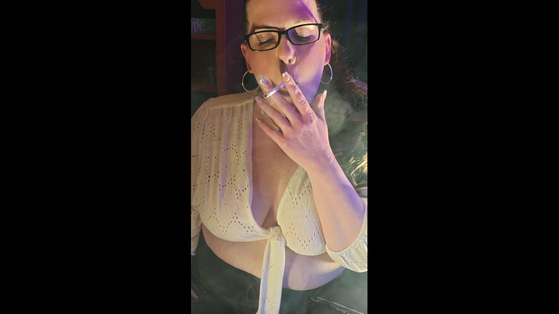 Standing In A Halter Top Blowing Smoke At You