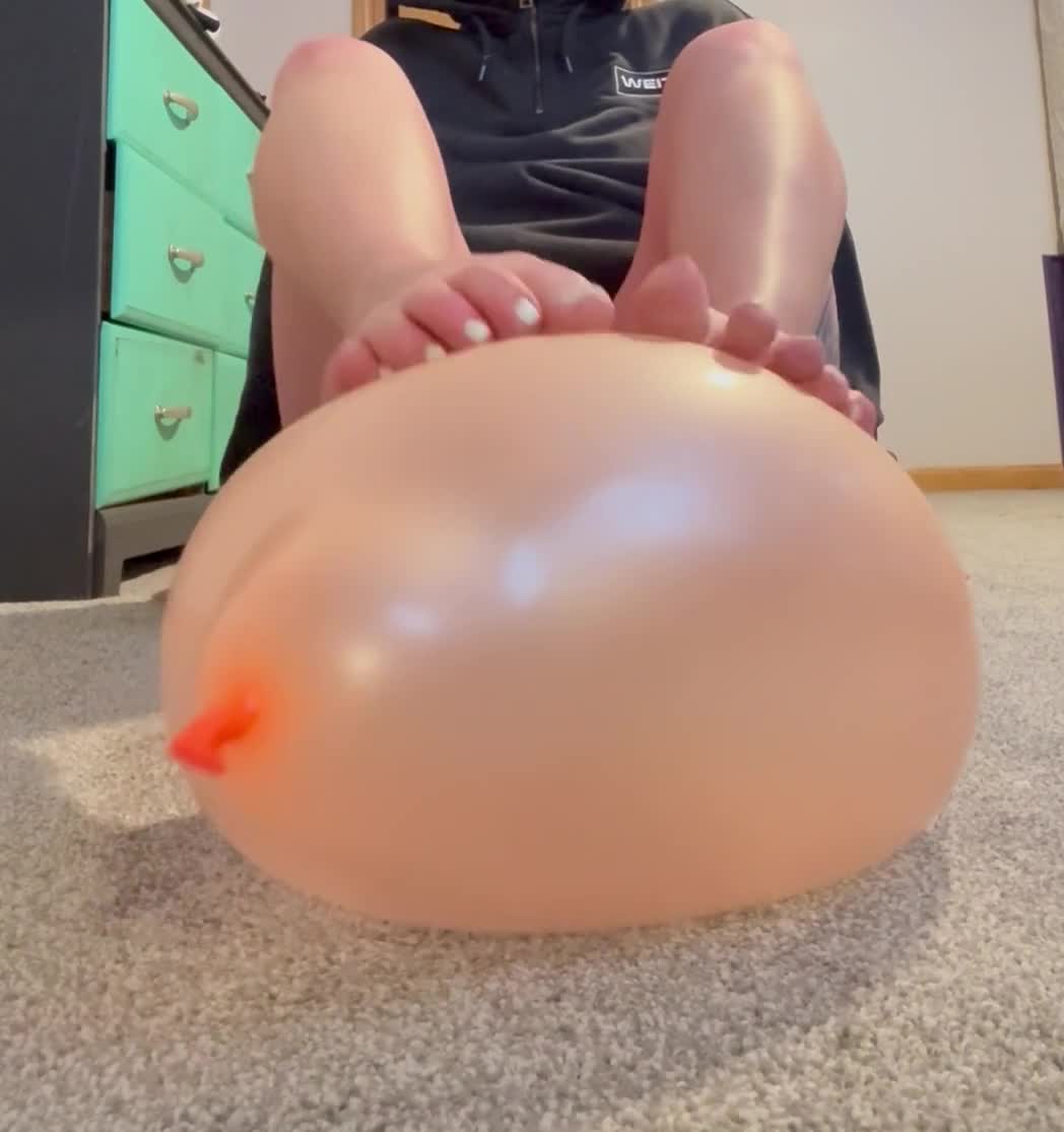 Feet Squeaking On Balloon