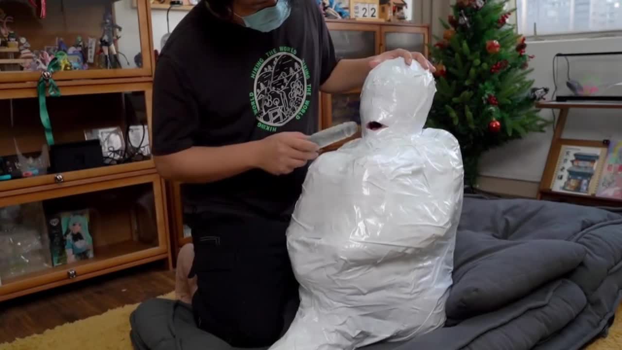 Fully Step-Mummy-Wrapped In Packing Tape 02