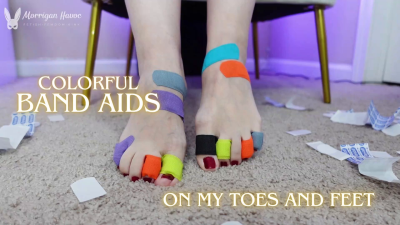 Colorful Band Aids On My Toes And Feet