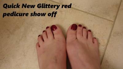 Quick New Pedicure Show Off Glittery Red Toenails