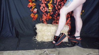Muscular Calves And Legs In Halloween Platforms With Autumn Set Up