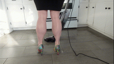 Muscular Calves While Vacuuming In Tie Dye Stilettos