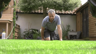 Gardener Gets A Soaking
