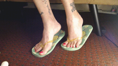 Hot Pink Painted Toenails In Flipflops Closeup