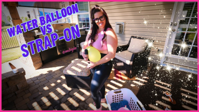 Breaking Huge Water Balloon With Strapon Dildo