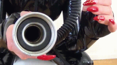 Heavy Rubber Dominatrix In Gas Mask