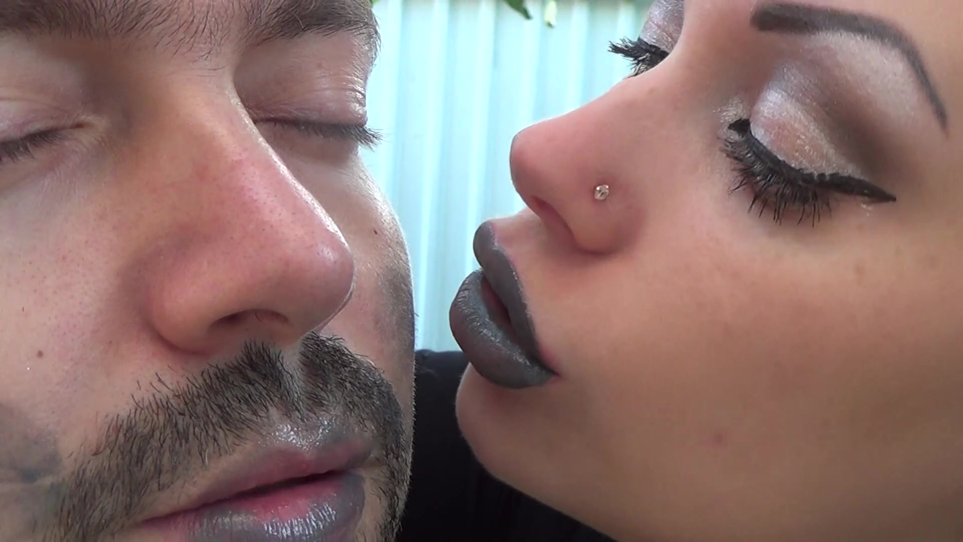 Playful red lip kiss