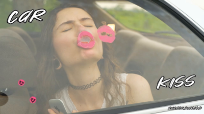 Messy Pink Lipgloss Marks On The Car Window