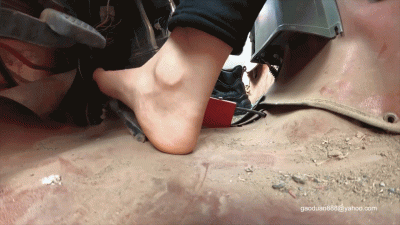 Zoe Driving Barefoot