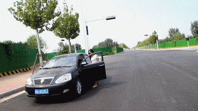 Martina Practicing Driving Outdoors