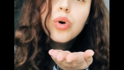 Brunette Blows You A Kiss