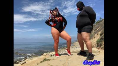 Ball Busting In Latex At Gimp Beach