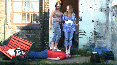 2 Girls Trampling Heels In The Garden Until His Face Goes Purple