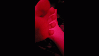 Foot Play In Pink Lighting
