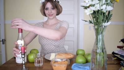 Brat Girl Eats Topless And Jiggles Tits