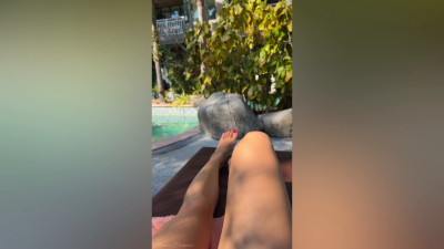 Feet Tease Outdoor While Watching A Movie