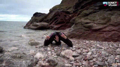 Rubber Girl Plays On The Beach