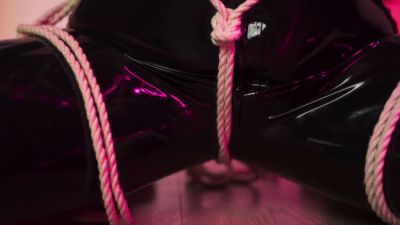 Sensual Bondage In A Latex Catsuit
