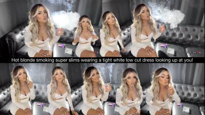 Hot Blonde Smoking Super Slims Wearing A Tight White Low Cut Dress Looking Up At You!