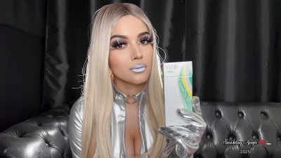 Futuristic Cyber Blonde Smoking Misty Menthol 120S Wearing Silver Outfit