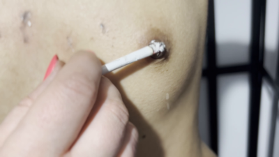 Extinguishing cigarette on slavegirls chest - Extreme LEZDOM