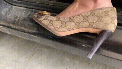 Driving At High Speed On The Freeway In Gucci High Heels