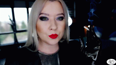 Smoking Eve With Red Matte Lips And Wearing Shiny Gloves