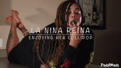 La Nina Reina Enjoying Her Lollipop