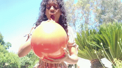 Sunlit Pop Ritual: Outdoor Balloon Blow & Burst